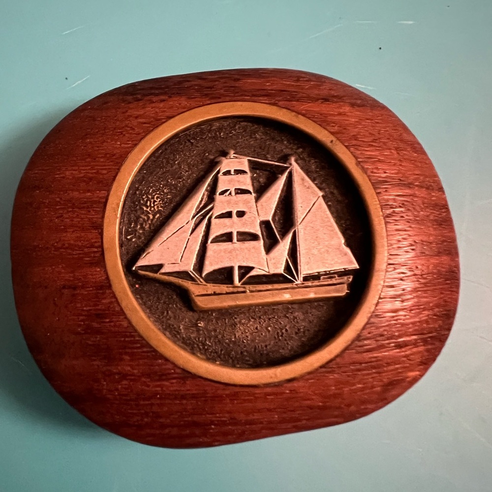 Belt buckle carved  wood and pewter inlay of a sailboat